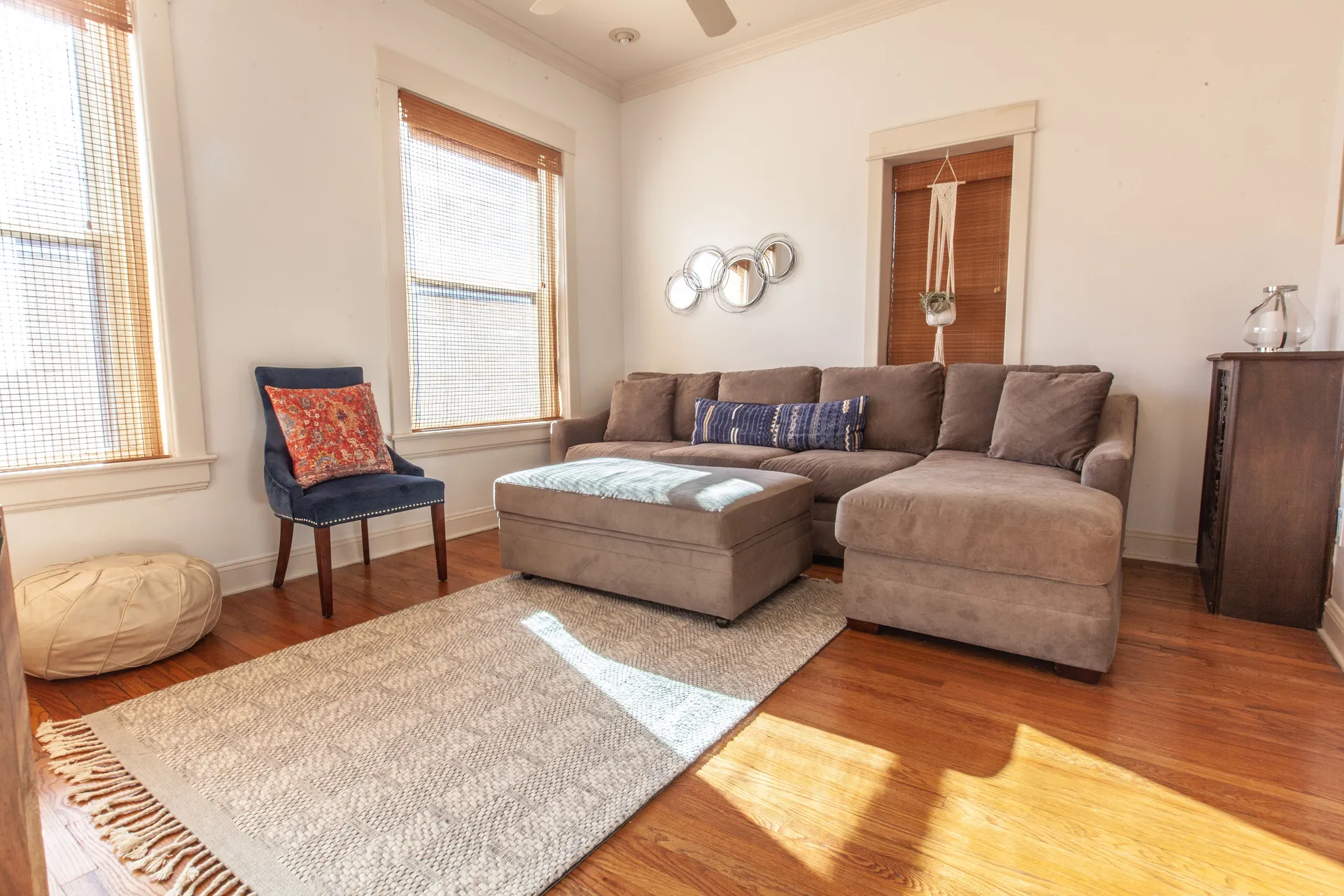 Loft B open-concept living room with 65-inch Roku TV and modern furnishings